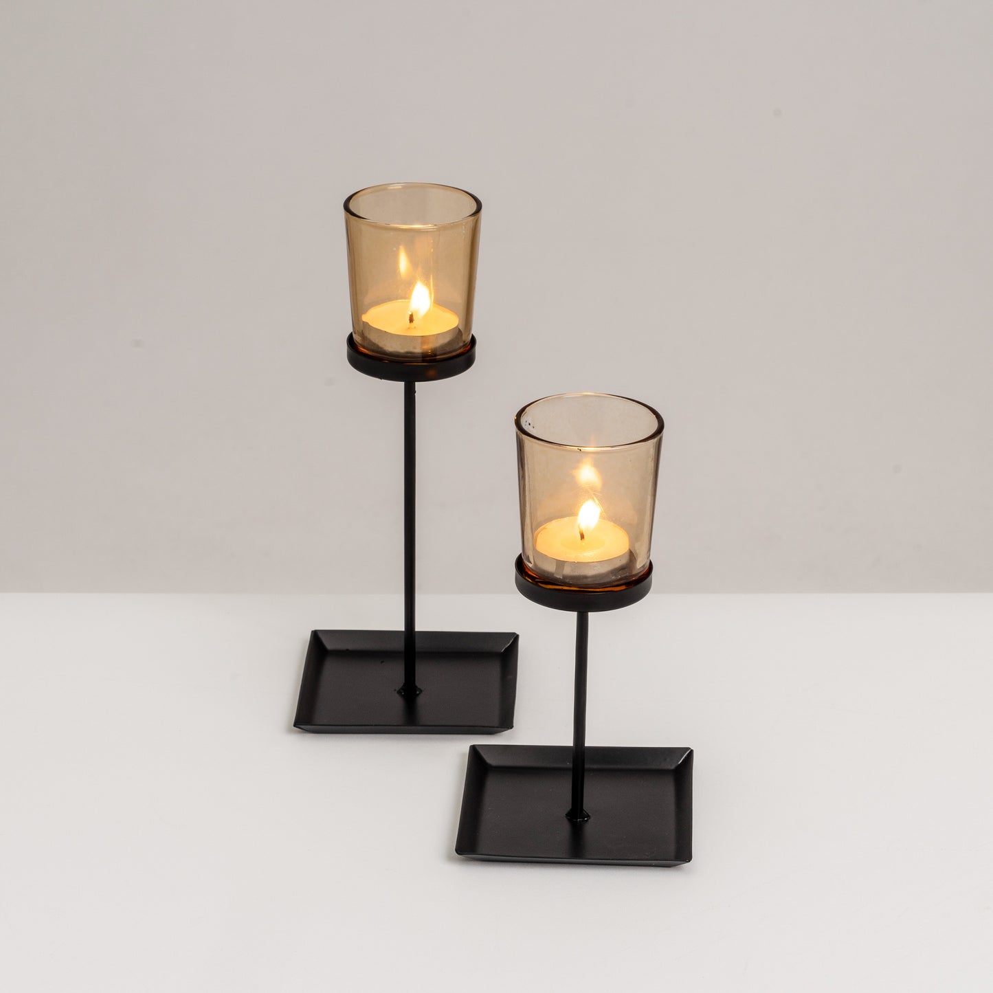 2 portavelas metal-cristal negro