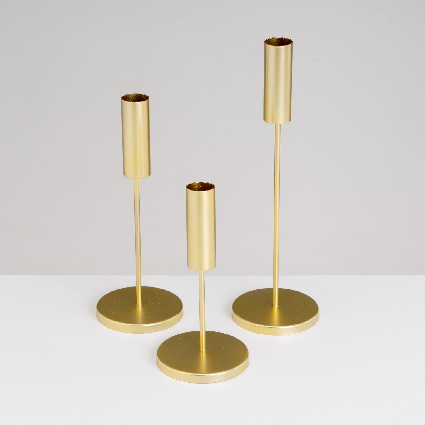 3 portavelas metal oro