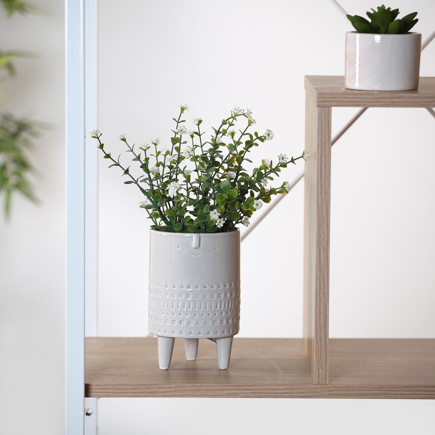 Macetero ceramica cara c/patas 15cm