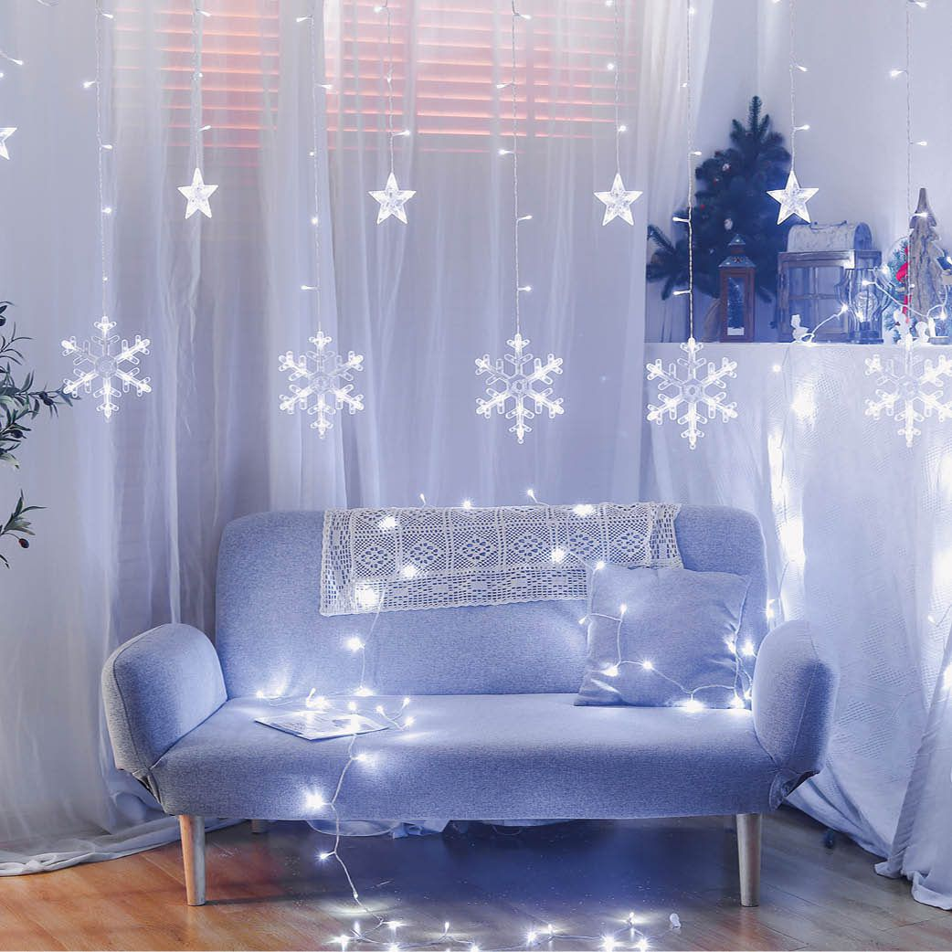 Cortina LED con estrellas y copos de nieve